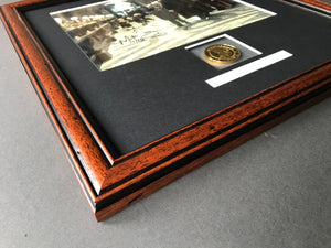 Harry Potter & The Philosopher’s Stone - A Prop Gringotts Coin inside an Autographed Display